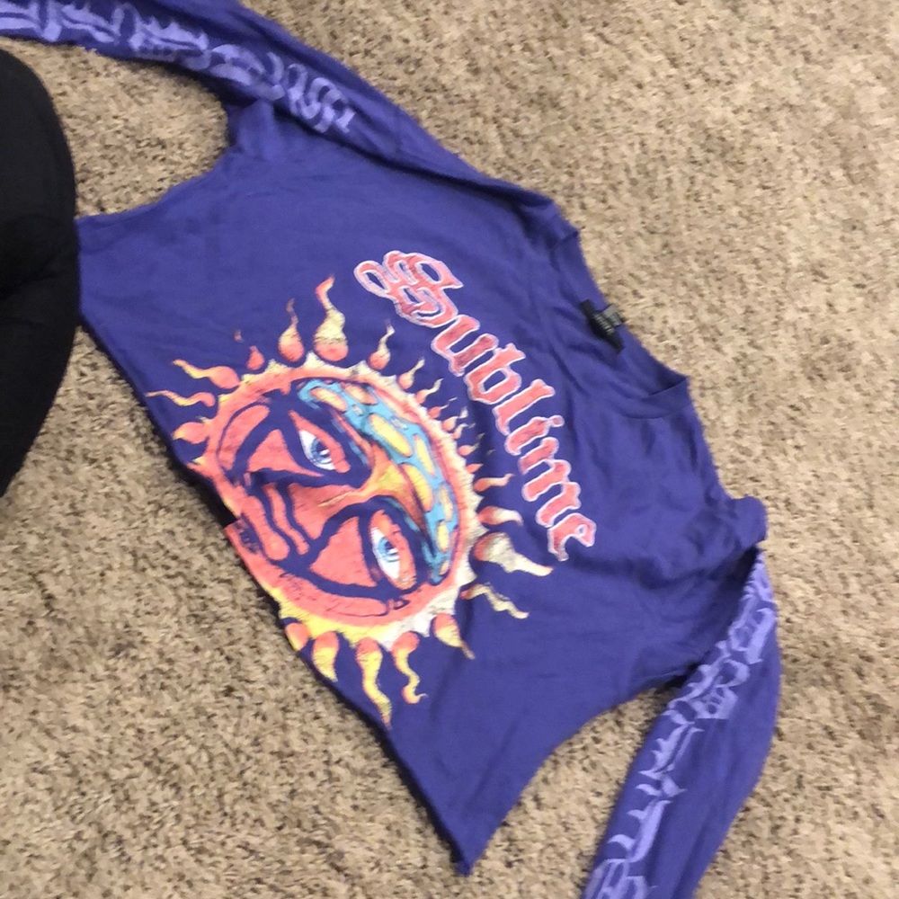 sublime shirts goes to belly button